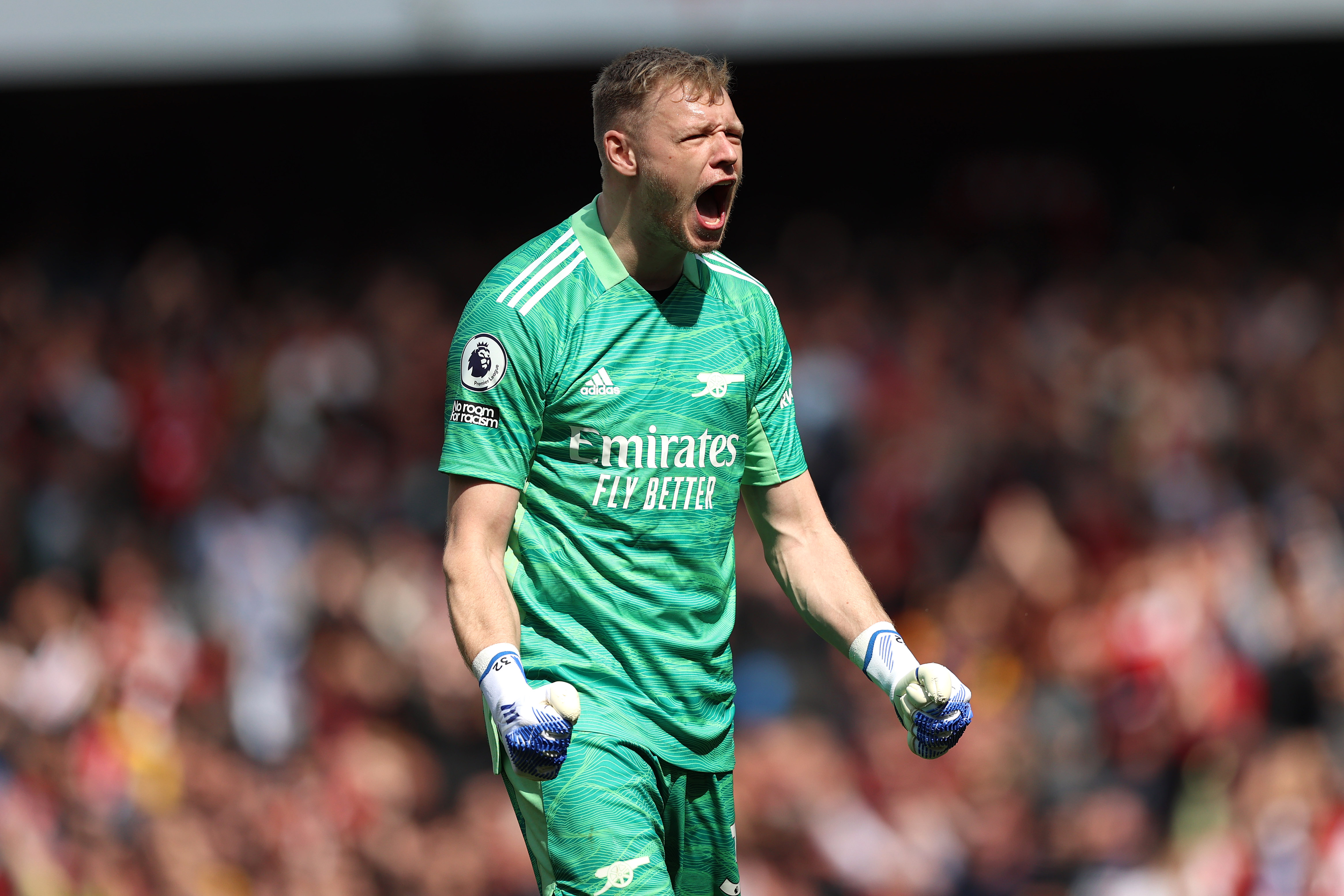 Arsenal goalkeeper Aaron Ramsdale appears to be kicked by